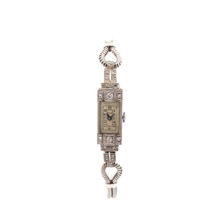 "Vergangenheitsschimmer" - Antike Armbanduhr in Platin