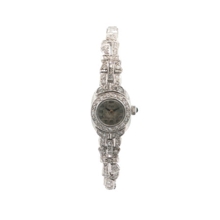 "Onsa Éclate" - Vintage Diamant Armbanduhr aus Platin