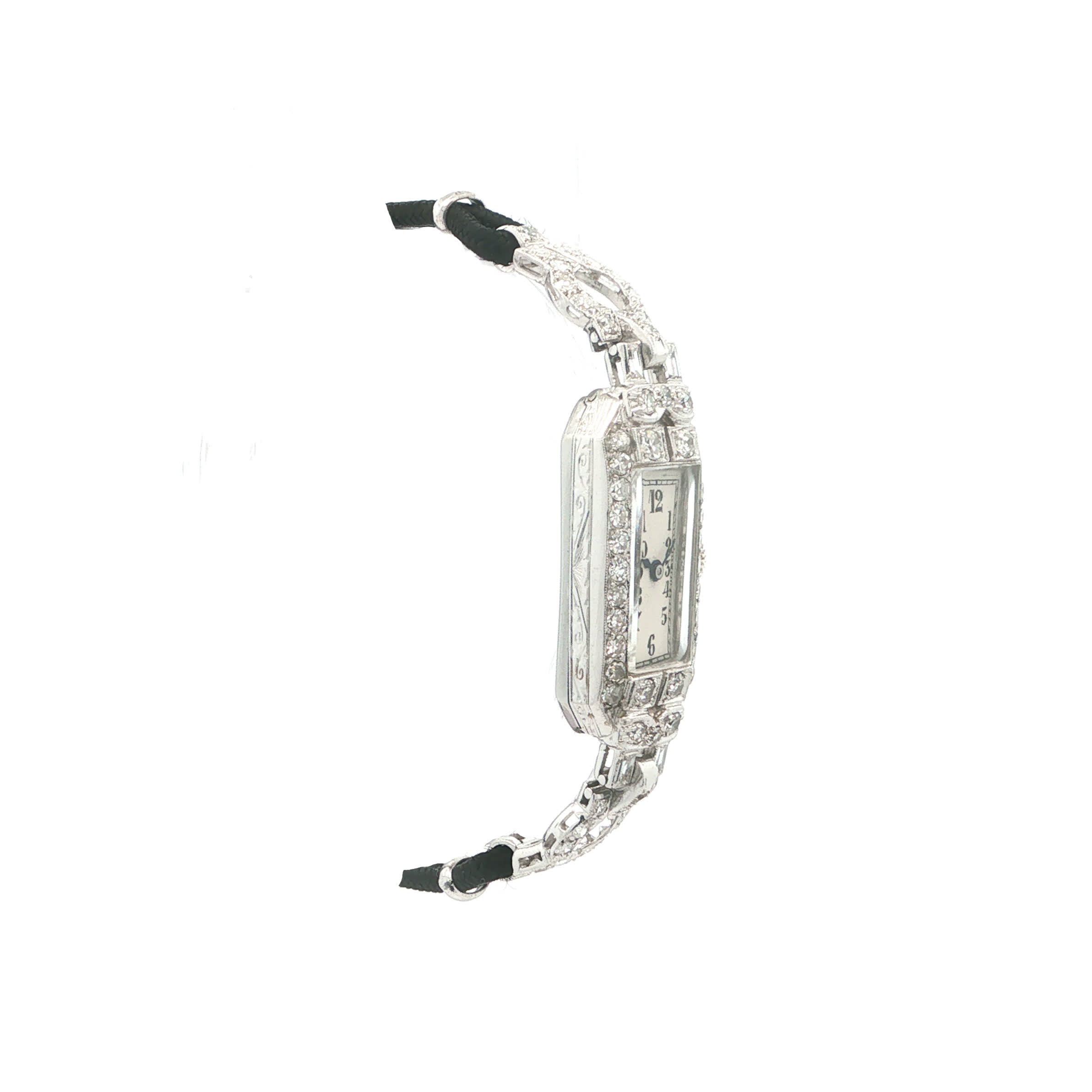 „Art Déco Éternelle“ – Antike Diamant Damenuhr aus Platin um 1930 - Juwelier Steiger