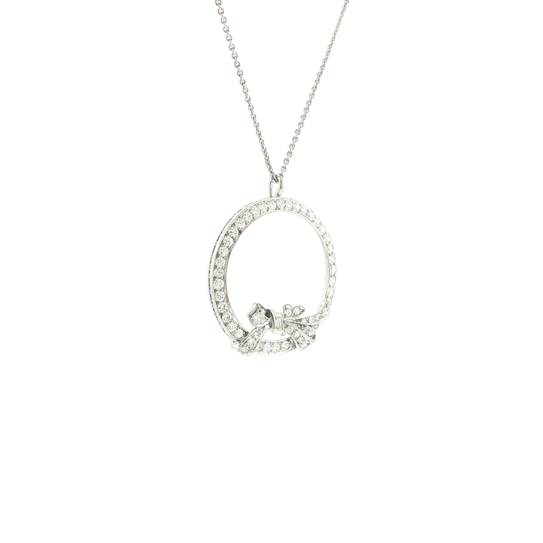 "Bow of Eternity" - Vintage Kette mit Anhänger aus Platin mit Brillanten - Juwelier Steiger