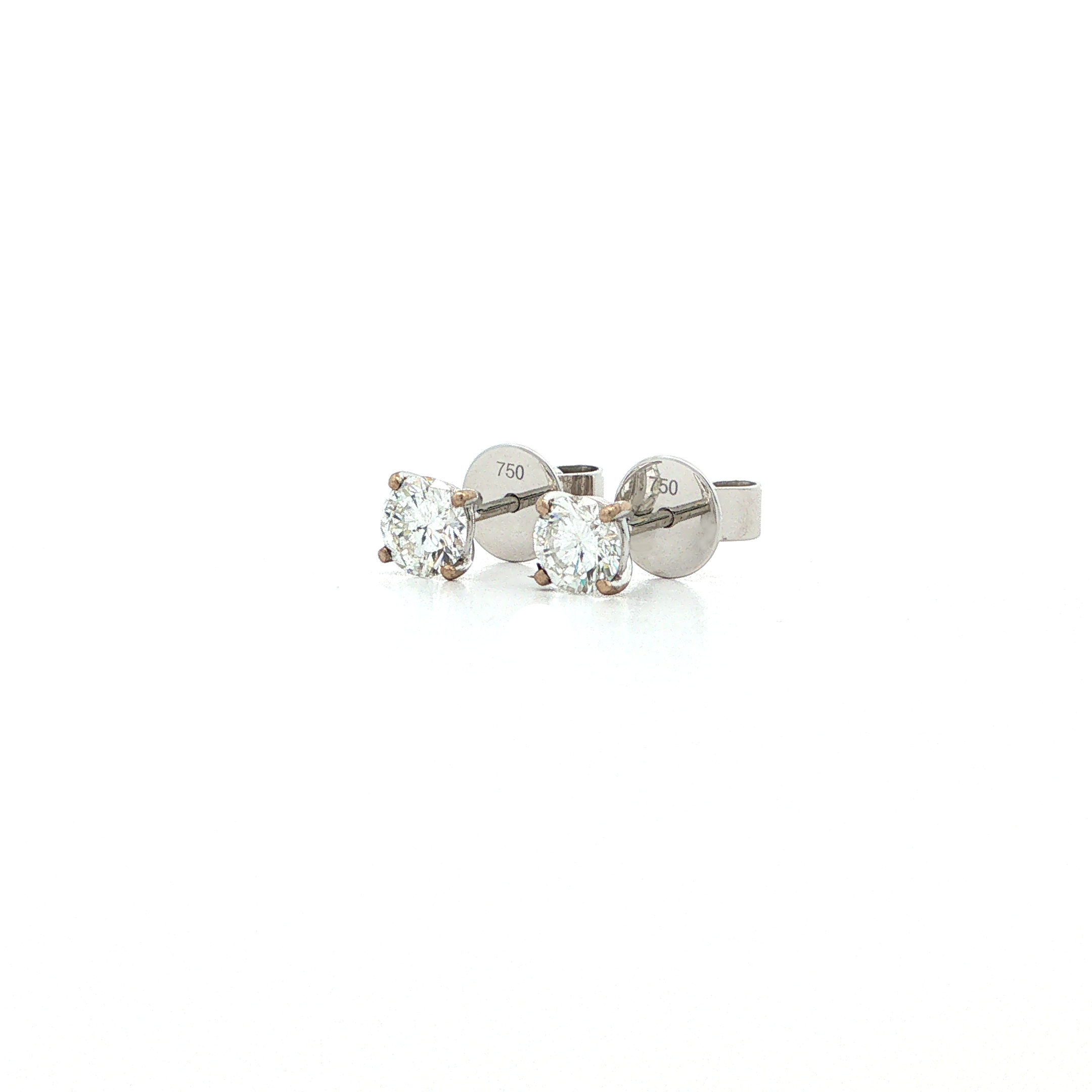 "Little shine" - Moderne Ohrstecker 4er Krappe mit Brillanten in 18 Karat Weißgold