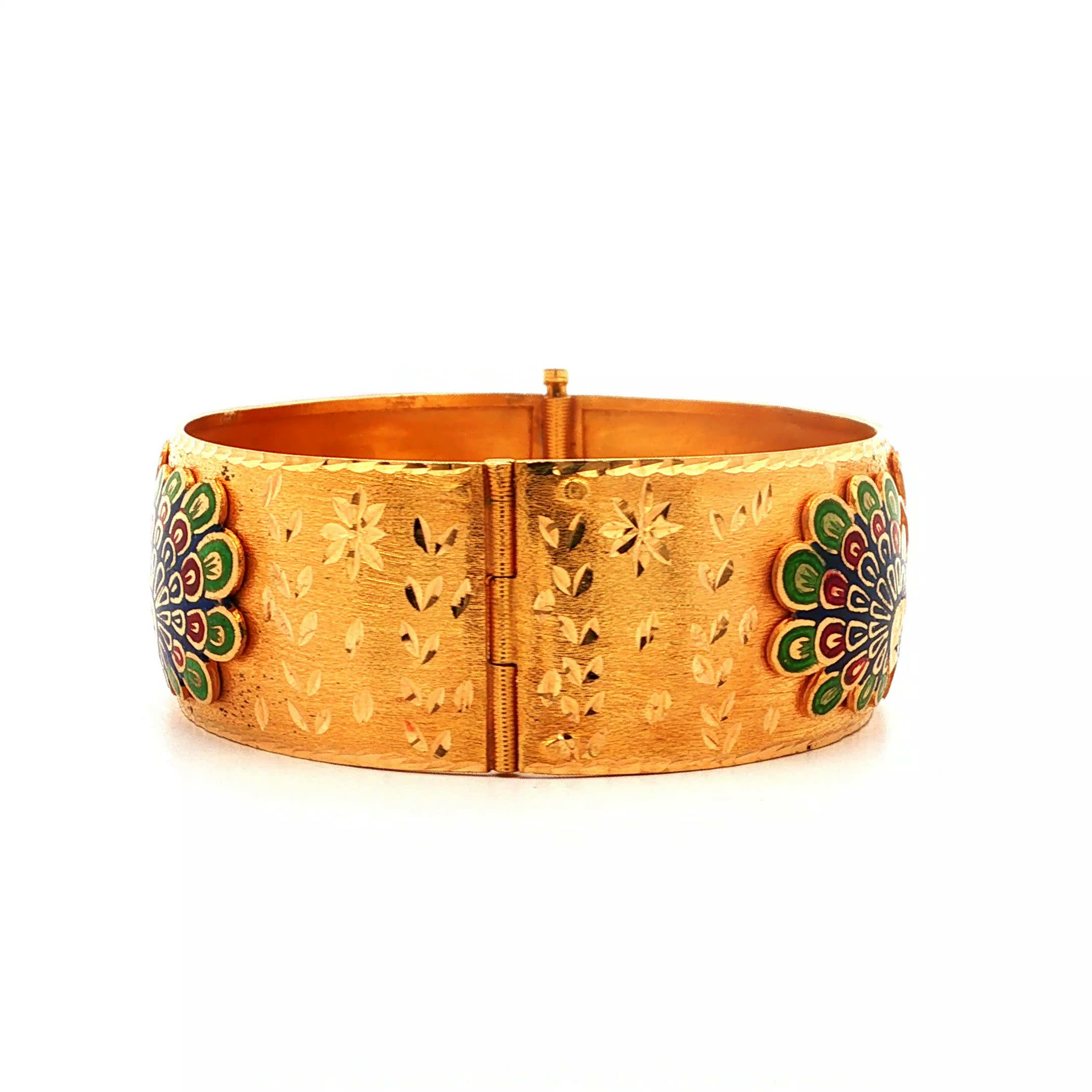 "Golden Maharani" - Vintage Armreif geschmückt mit bunter Emaille aus 900er Gold - Juwelier Steiger