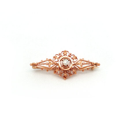 "Petite Arabesque" - Antike Brosche in 14kt Rosegold mit Diamant im Altschliff - Juwelier Steiger